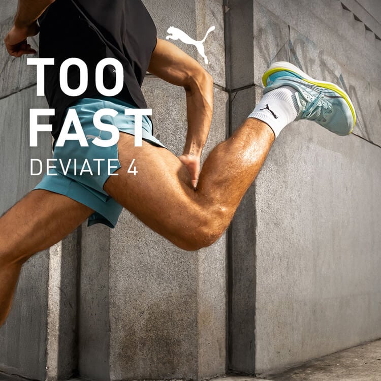 Ragazzo che corre con scarpe da running Puma Deviate 4