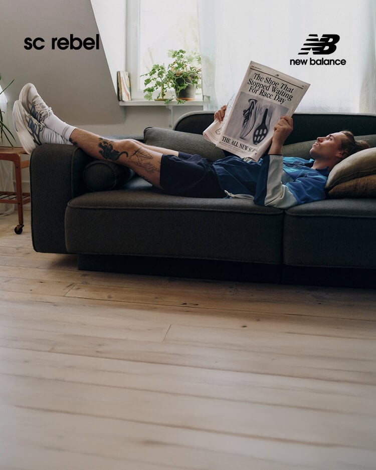 Ragazzo che indossa scarpe da running New Balance SC Rebel V1