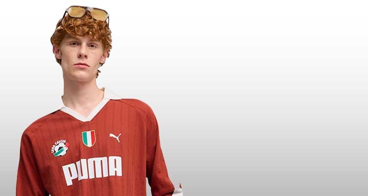 Ragazzo che indossa maglia calcio da allenamento PUMA