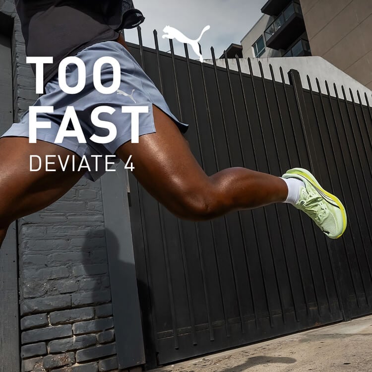 Ragazzo che corre con scarpe da running Puma Deviate 4