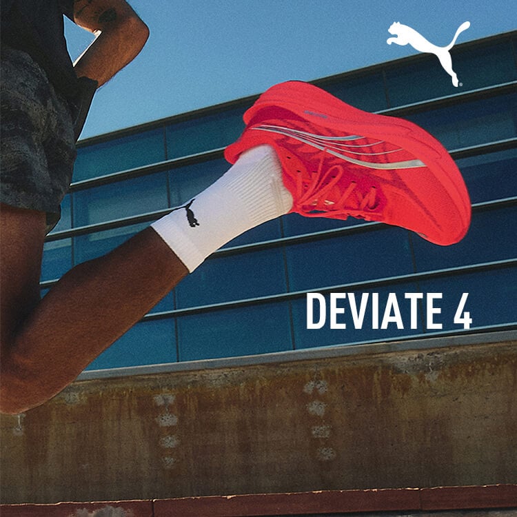 Ragazzo che corre con scarpe da running Puma Deviate Nitro 4
