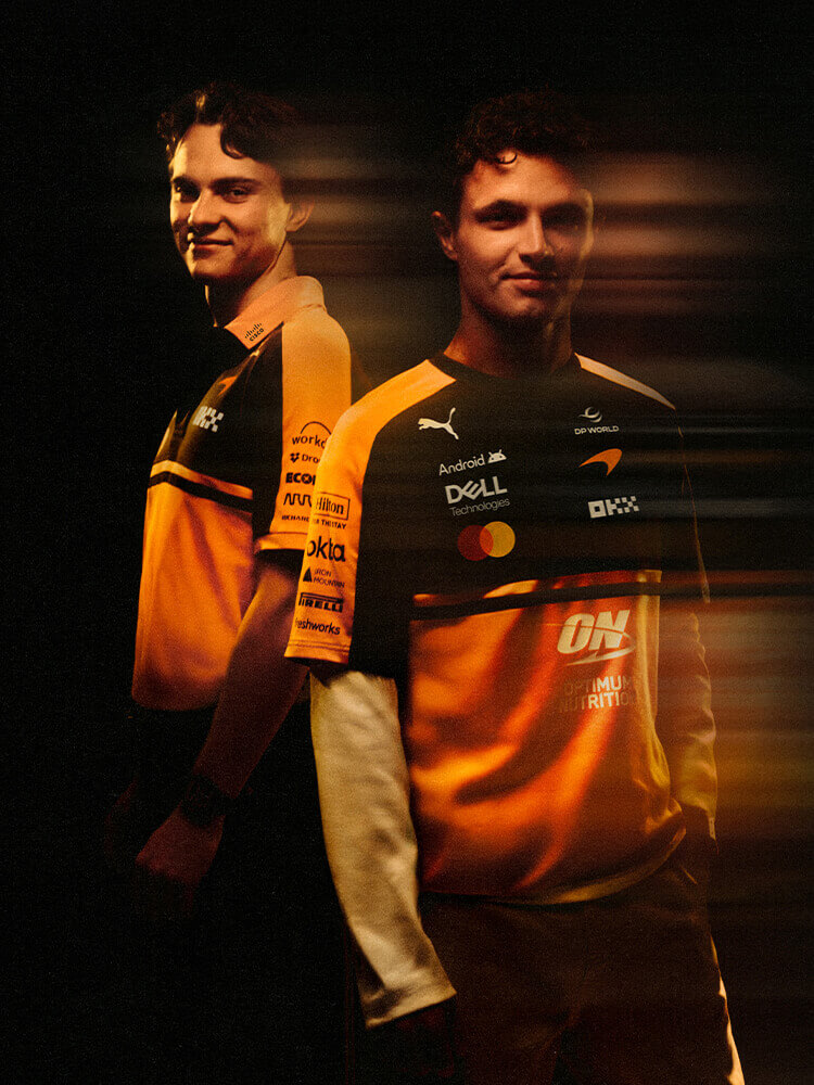 Piloti che indossano abbigliamento sportswear McLaren x Formula 1